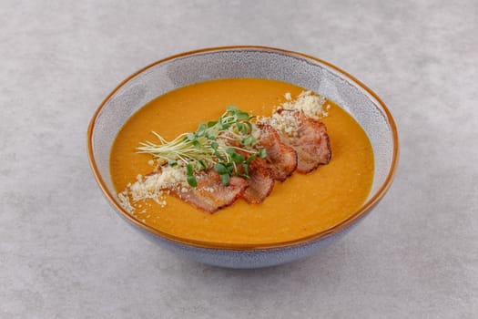 Soup with lentils and bacon on a white background studio shooting
