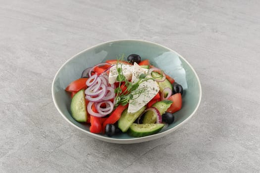 Greek salad on a stone background studio shooting 1