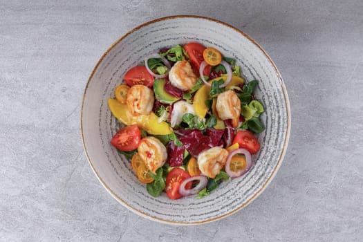 bowl with avocado shrimp and kumquat on stone background, studio food photography 2