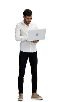 man on a white background. uses a computer.