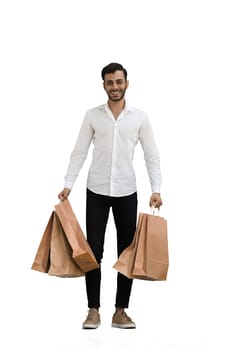 Man on a white background with shoppers.