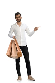 Man on a white background with shoppers point side.