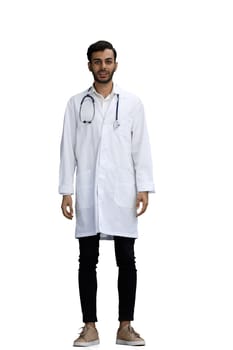 male doctor on a white background in full growth.