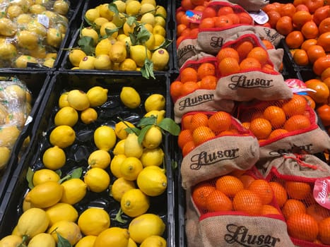 Fresh lemon fruits and Mandarin orange fruits, as a background,, Mediterranean diet, vitamin C. Lemon harvest, High quality photo