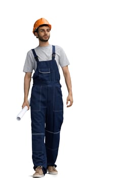 A builder male on a white background look side.