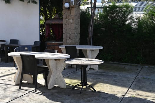 table and chairs in a restaurant in Cyprus in winter outdoors