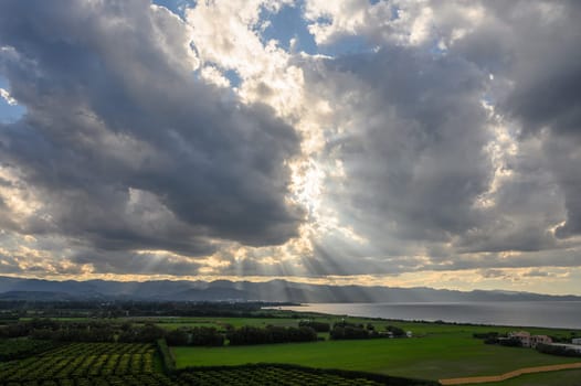 clouds and sun rays over the Mediterranean sea and mountains in winter in Cyprus 4