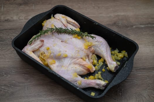 chicken tabaka marinated before cooking in the kitchen 5