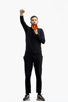 A man, full-length, on a white background, with a megaphone.