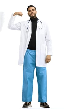 The doctor, in full height, on a white background, shows strength.