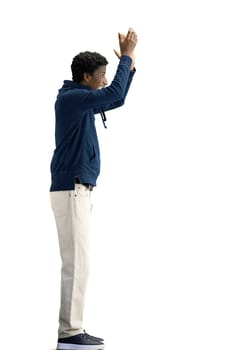 A man, full-length, on a white background, claps.