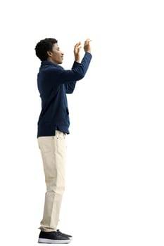 A man, full-length, on a white background, waving his arms.