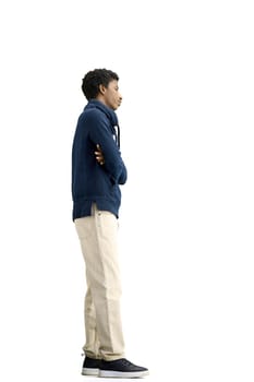 A man, full-length, on a white background, crossed his arms.