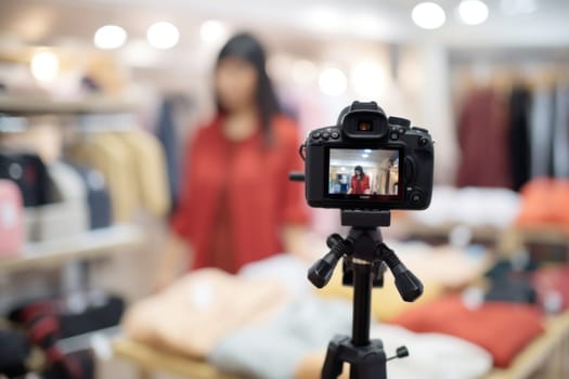 Woman doing a live broadcast, shopping online concept.