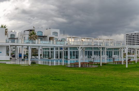 residential complex with white houses on the seashore in Cyprus 2