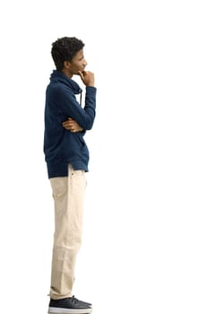 A man, full-length, on a white background, thinks.