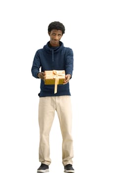 A man, full-length, on a white background, with a gift.