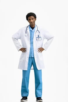 Doctor, full-length, on a white background, hands on hips.