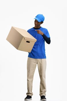 The deliveryman, in full height, on a white background, points to the box.