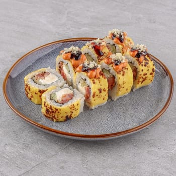 Spicy Tuna roll on a stone background studio shooting