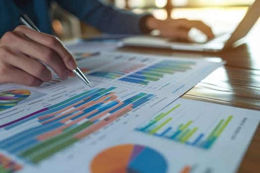 Hands of businesswoman examining graph at desk, Financial advisor and accounting concept.