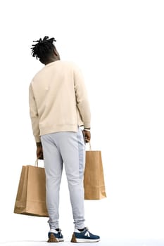 A man, full-length, on a white background, with bags.