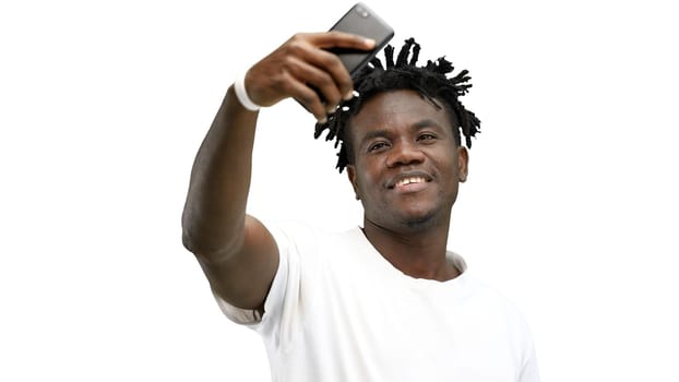 Man, close-up, on a white background, talking on the phone.