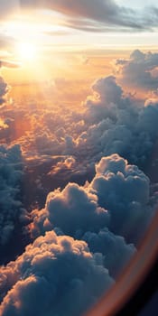 An aerial perspective of a breathtaking sunrise illuminating the fluffy texture of clouds from above.