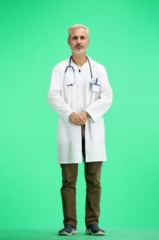 Doctor, full-length, on a green background.
