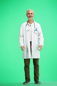 Doctor, full-length, on a green background.