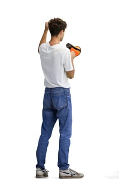 A man in a white T-shirt, on a white background, full-length, with a megaphone.