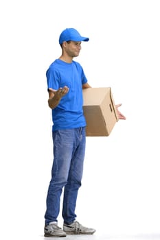 A male deliveryman, on a white background, full-length, with a box.