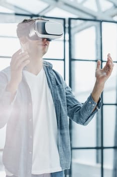 man using vr glasses to view educational material and financial documents
