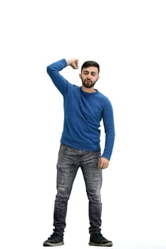 A man, full-length, on a white background, rejoices.
