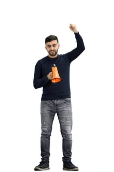 A man, full-length, on a white background, with a megaphone.