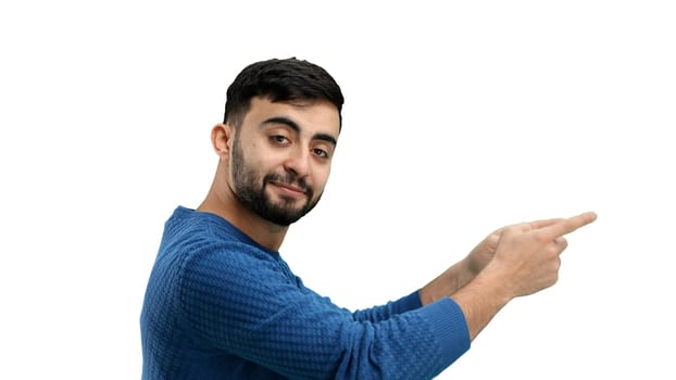 A man, close-up, on a white background, points to the side.