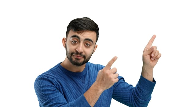 Man, close-up, on a white background, pointing up.