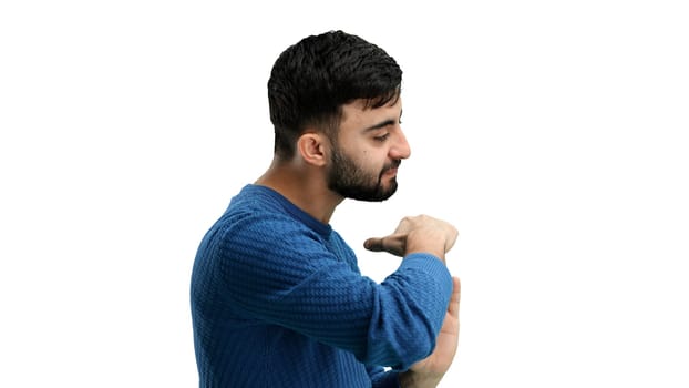 A man, close-up, on a white background, shows a pause sign.