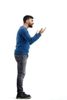A man, full-length, on a white background, spreads his arms.