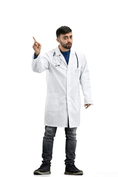 The doctor, in full height, on a white background, shows a stop sign.
