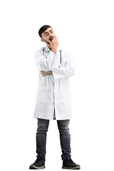 The doctor, in full height, on a white background, thinks.