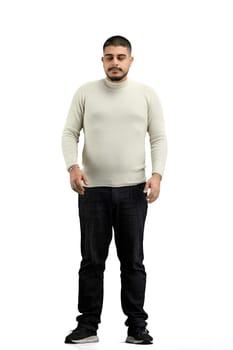 A man, full-length, on a white background.