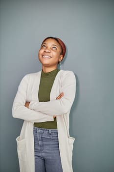 Close-up photo of a pretty, pensive dark-skinned girl, student, manager, secretary, freelancer
