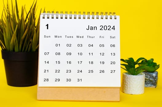 January 2024 calendar with yellow over background. Monthly calendar concept.
