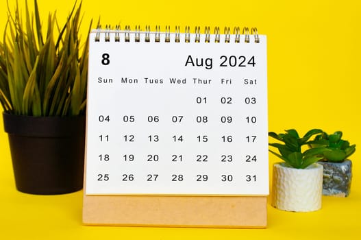 August 2024 calendar with yellow over background. Monthly calendar concept.