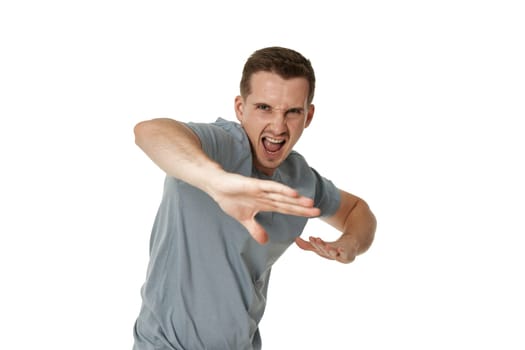 annoyed angry man fighting on white studio background