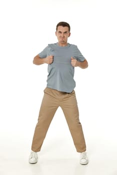 annoyed angry man shouting on white studio background