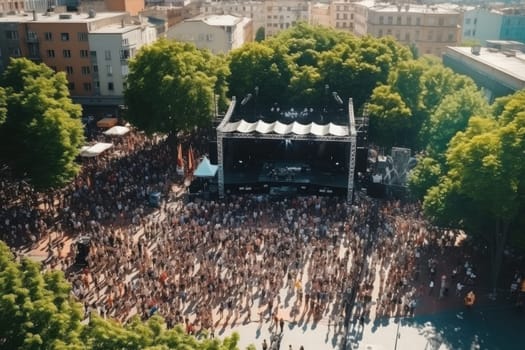 Photo of Crowd of people watching a music concert.