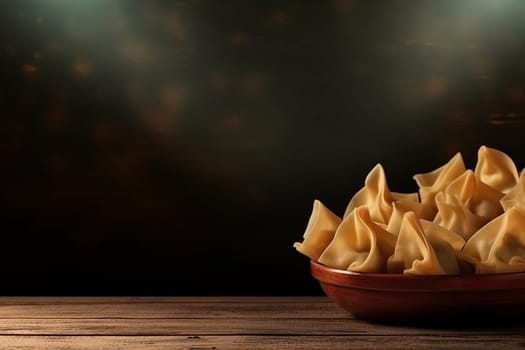Arranged dumplings on dark background, ready to be cook