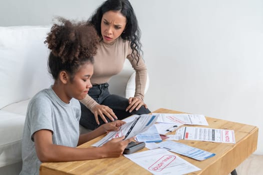 Stressed African American women has financial problems with credit card debt to pay crucial show concept of bad personal money and mortgage pay management crisis.